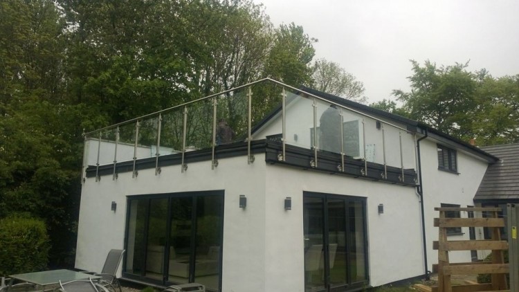glass-steel-balustrades-firestone-rubber-roofing.jpg